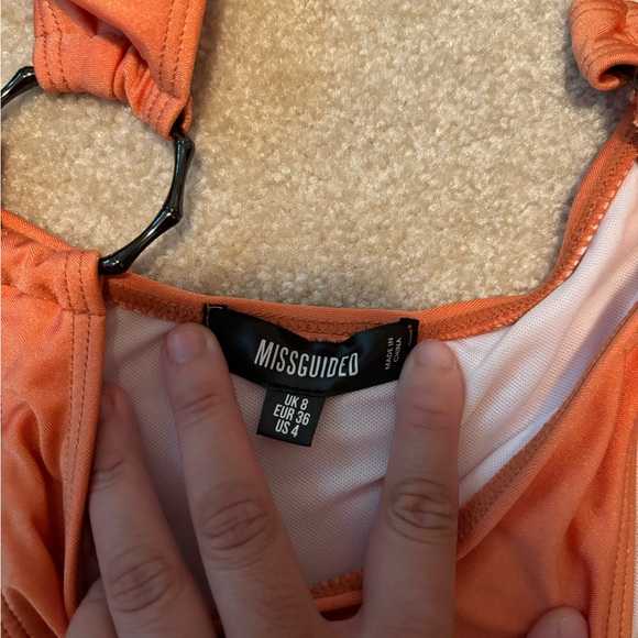 Orange one piece swimsuit with side cutouts - Picture 3 of 3